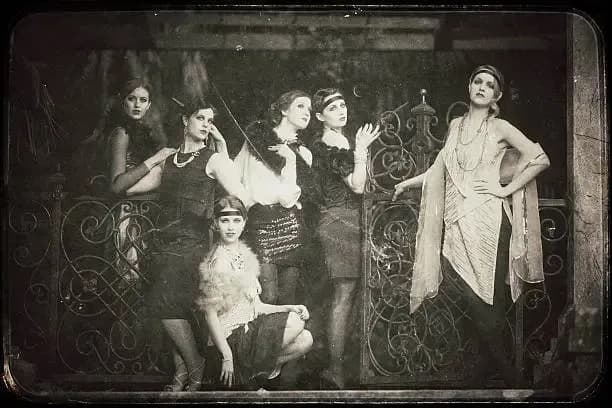 Vintage-style portrait of women in 1920s Red Light District attire